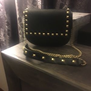 Sexy BCBG bag with gold studs